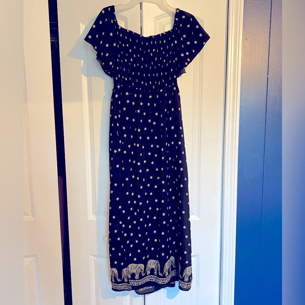 Black bohemian dress for sale. Slits up the side for extra comfort and style.